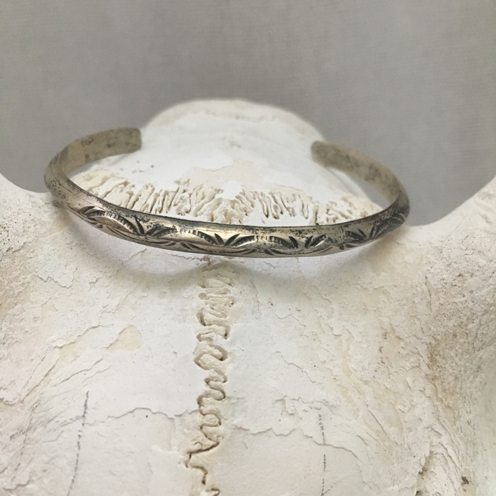 Petite SW stamped silver cuff